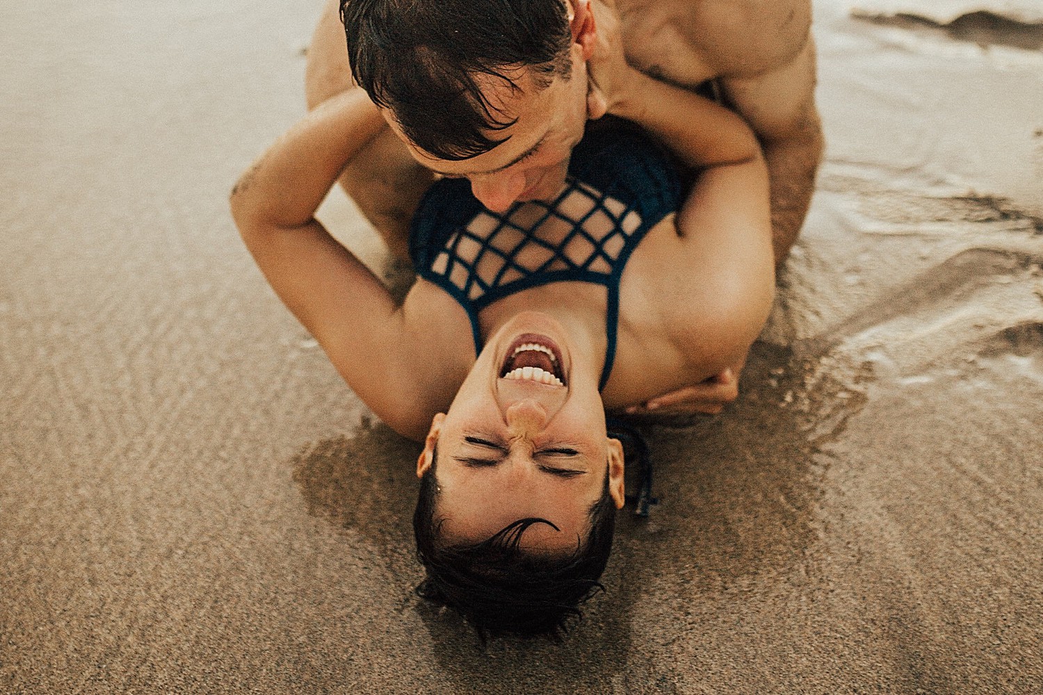 adventurous couple session on a beach in Hawaii
